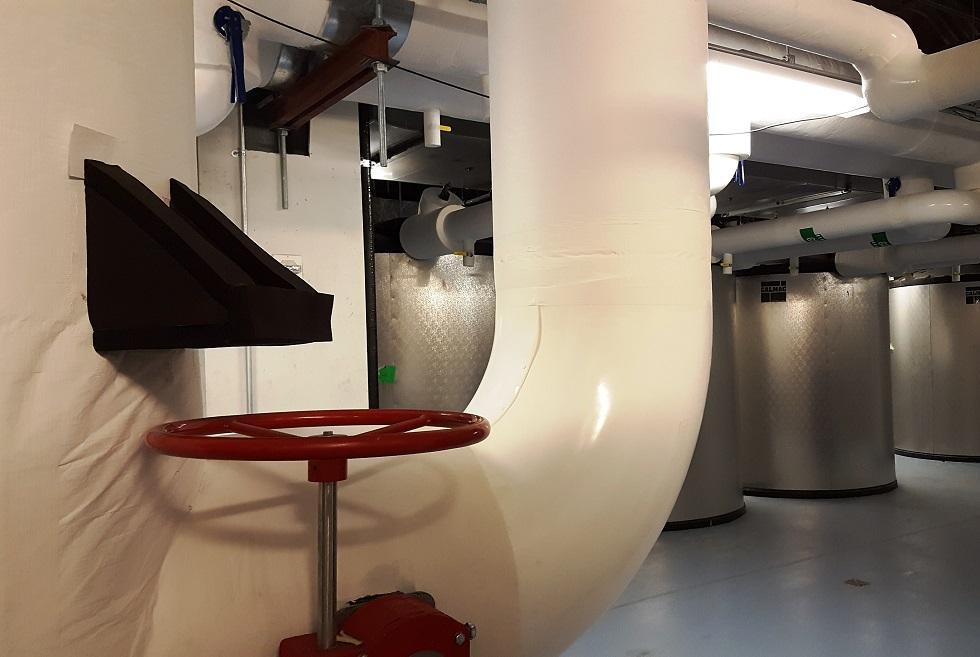 Detail image of insulated chilled water piping and valve